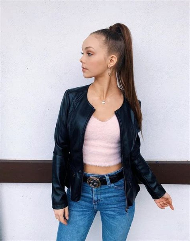 Savannah May poses